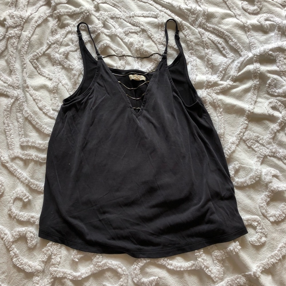 Charcoal grey tank with chains across v-neck